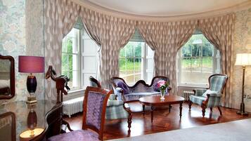Suite, Garden View | Individually decorated, individually furnished, desk, blackout drapes