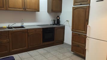 Apartment | Private kitchen | Fridge, oven, stovetop, dishwasher