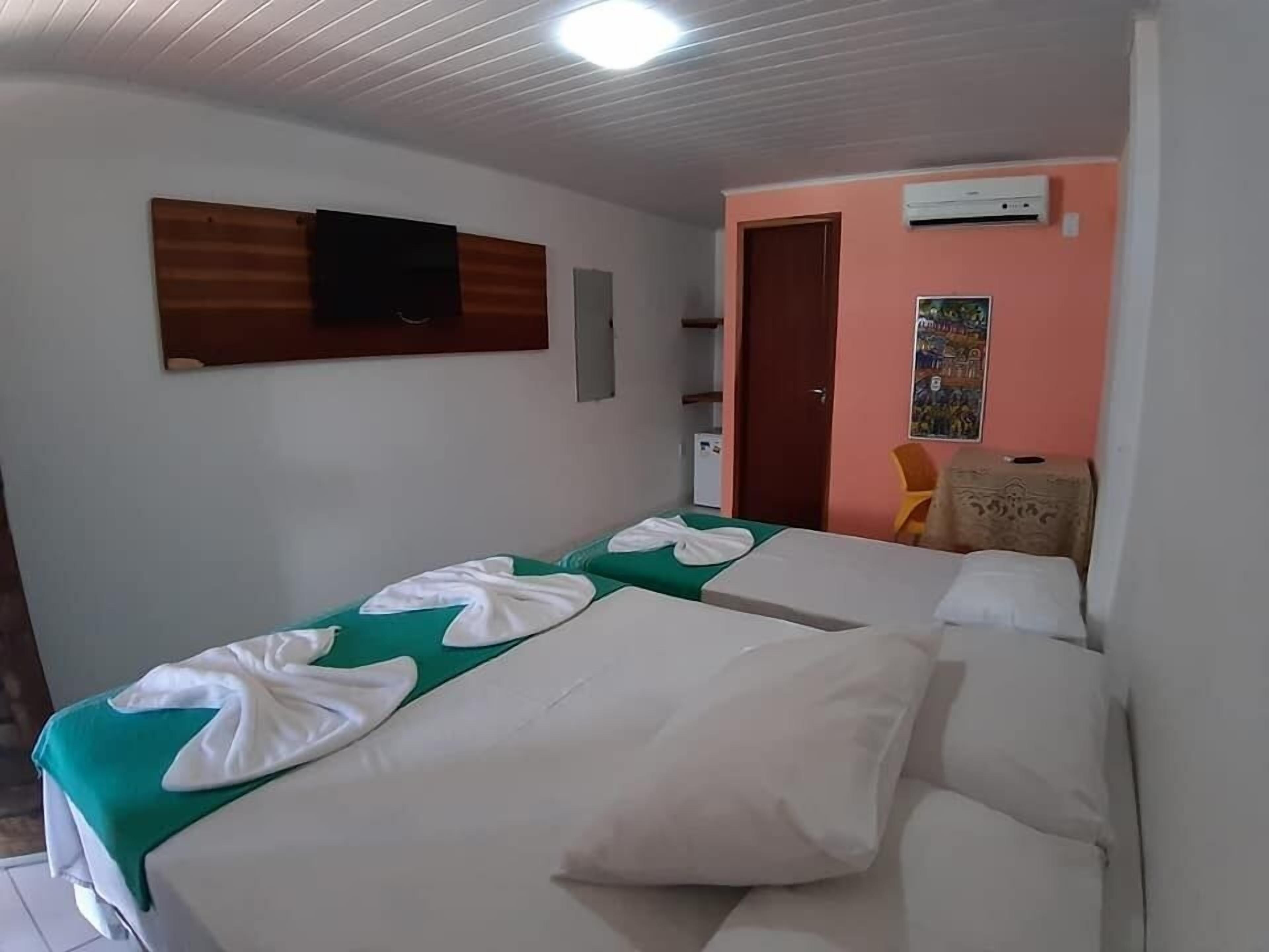 Dreibettzimmer | Minibar, Verdunkelungsvorhänge, Zustellbetten, kostenloses WLAN