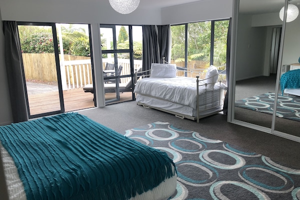 Master bedroom flows to north facing (all day sun) deck.