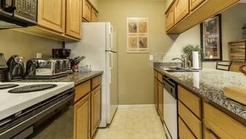 Condo | Private kitchen | Full-size fridge, microwave, oven, stovetop