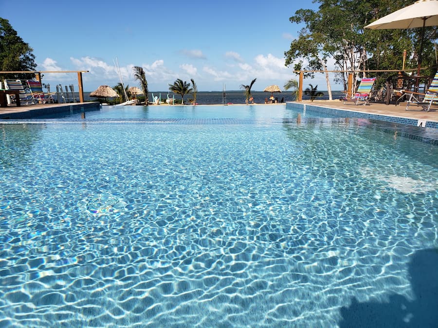 Outdoor pool, open 10:00 AM to 10:00 PM, pool umbrellas, sun loungers