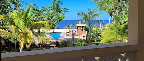 Outdoor pool, open 10:00 AM to 10:00 PM, pool umbrellas, pool loungers