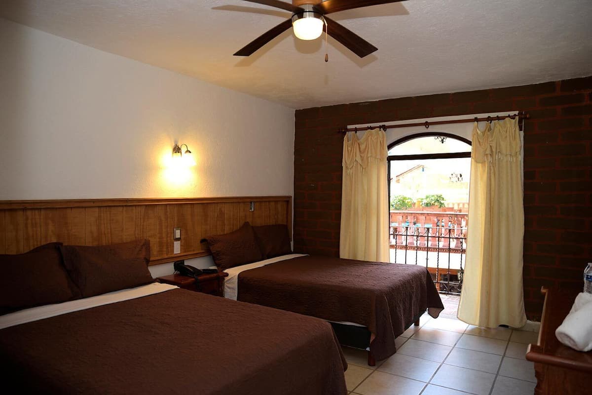 Deluxe Quadruple Room (Deluxe) | Free WiFi, bed sheets
