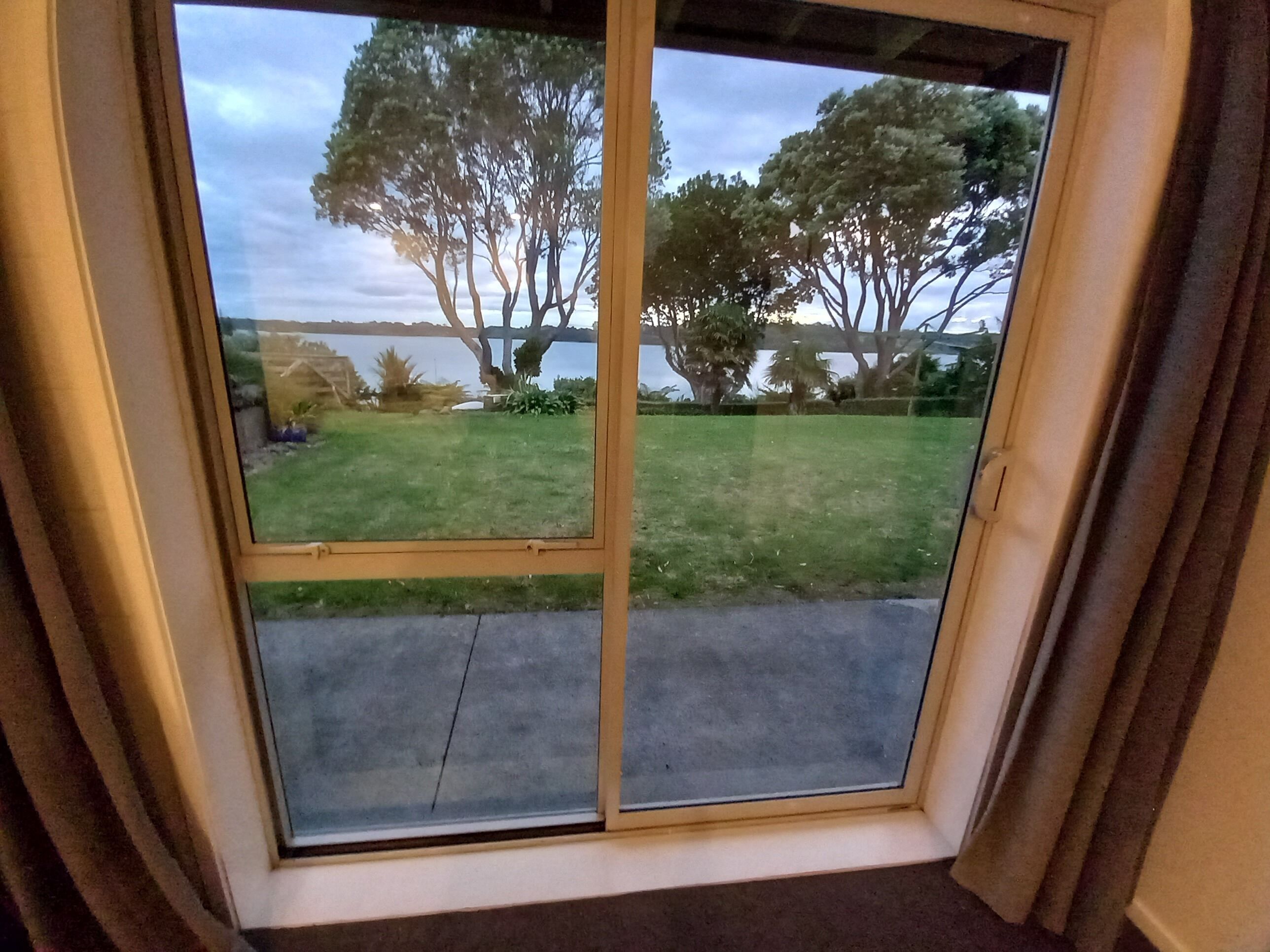 bedroom 1 looking out[sliding door]