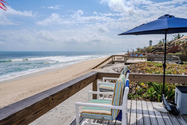 On the beach, sun loungers, beach towels