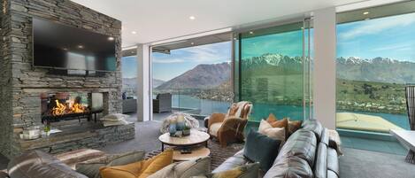 Smart TV, fireplace, books, stereo