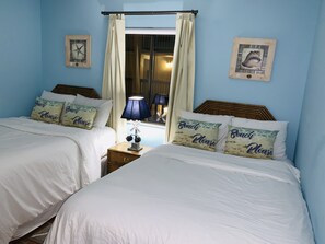 Condo familiar, vista al resort | Ropa de cama hipoalergénica y cortinas blackout