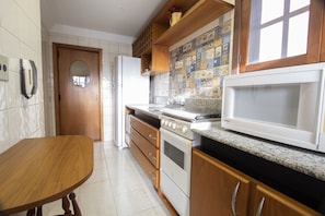 Apartment | Private kitchen | Full-size fridge, microwave, oven, dishwasher