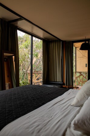 Verduisterende gordijnen, gratis wifi, beddengoed