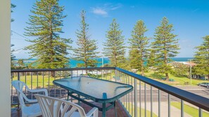 Enjoy a meal or relax on the balcony with a view of the coastal landscape.