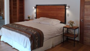 Habitación Deluxe | Sábanas de algodón egipcio, ropa de cama de alta calidad y edredón 