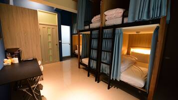 Premium bedding, pillow-top beds, desk, laptop workspace