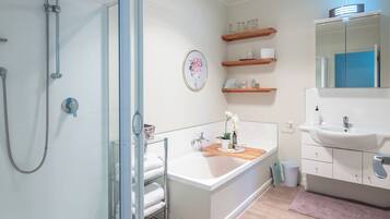 Shower, hair dryer, towels, soap