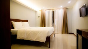 Quarto luxo | Frigobar, cofres nos quartos, escrivaninha, Wi-Fi de cortesia