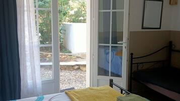 Habitación doble | Cunas, wifi gratis y ropa de cama