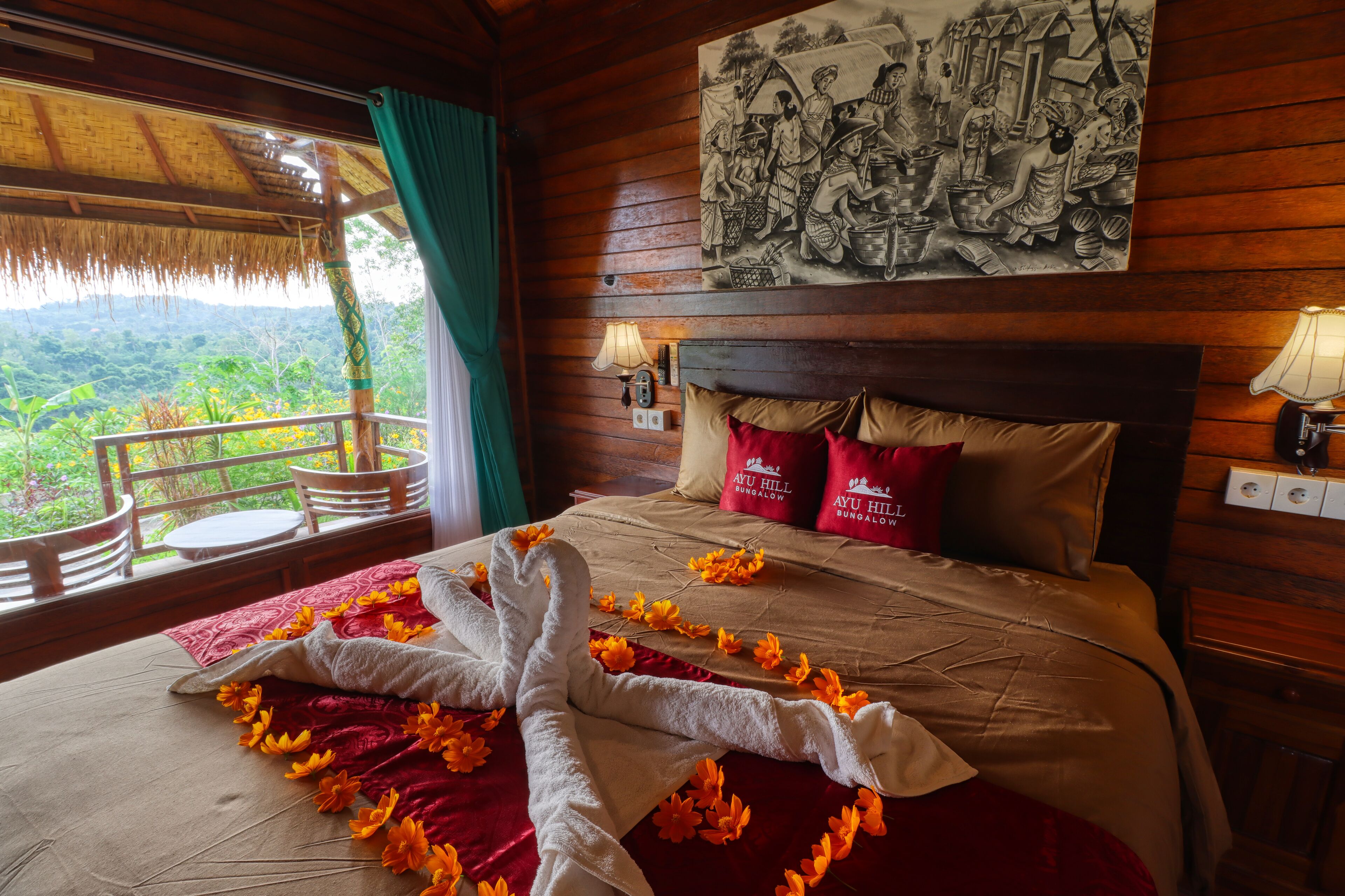 A wooden room with a bed, a painting, and a balcony with a view of the forest.