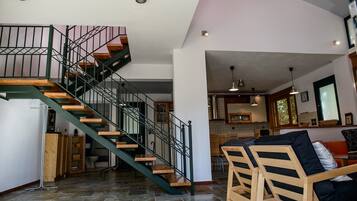 Villa | Living area | Flat-screen TV, fireplace