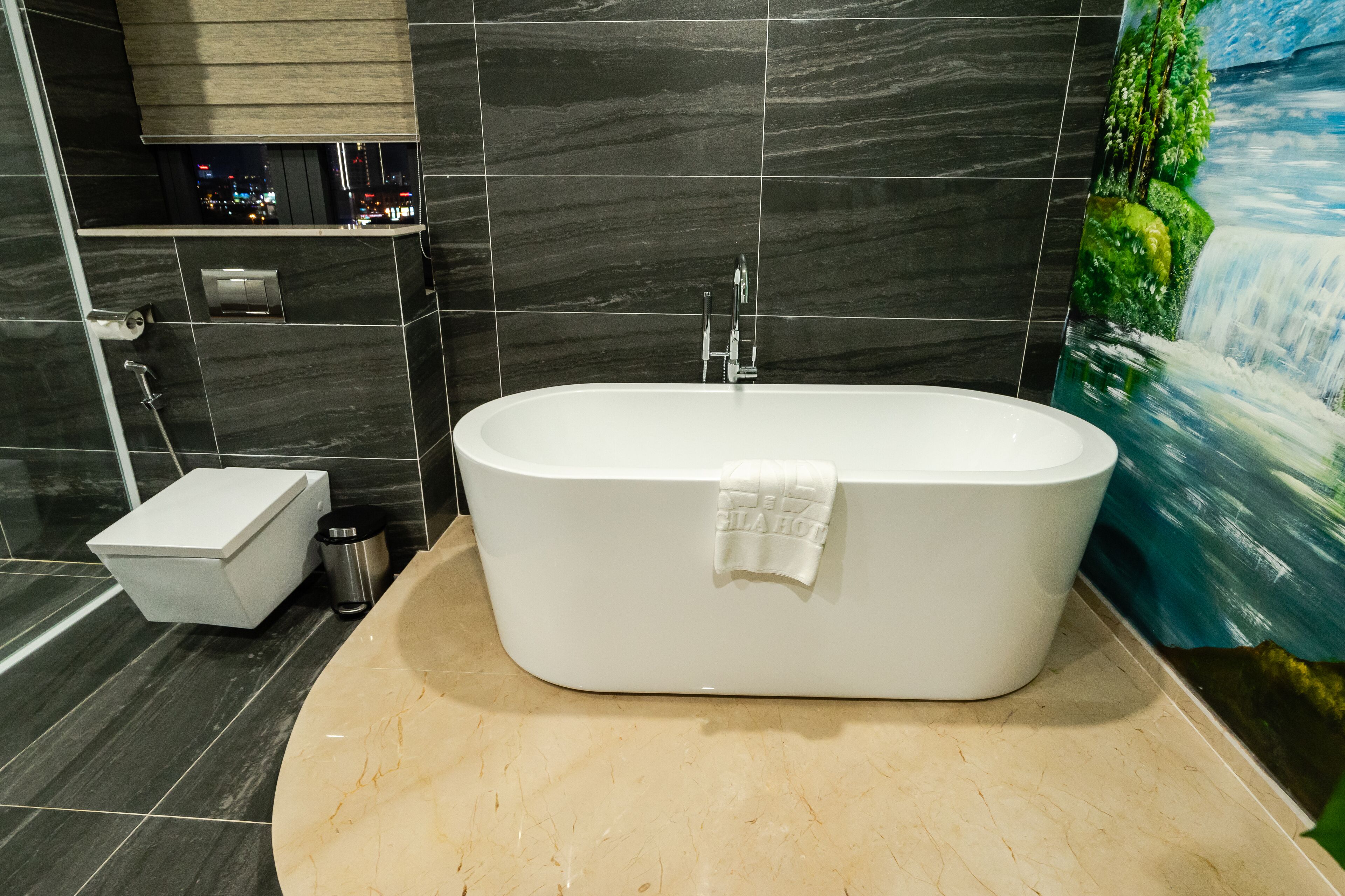 presidential suite | bathroom | rainfall showerhead, designer toiletries, hair dryer, bathrobes