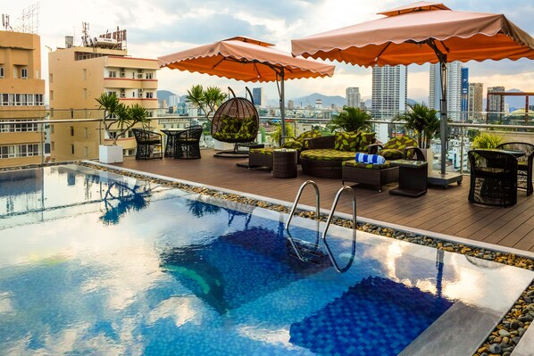 Outdoor pool, open 6:00 AM to 10:00 PM, pool umbrellas, sun loungers - Nagila Boutique Hotel (Da Nang)