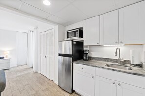 Fridge, microwave, coffee/tea maker, toaster