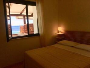 Bungalow, Beachside | 1 bedroom, cots/infant beds, bed sheets - Villaggio Dolce Vita (Montecorice)