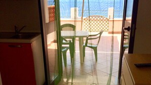 Bungalow, Sea View | 1 bedroom, cots/infant beds, bed sheets - Villaggio Dolce Vita (Montecorice)