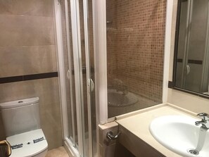 Hair dryer, towels, soap, shampoo
