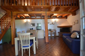 Apartment, 2 Bedrooms | Living area | Flat-screen TV