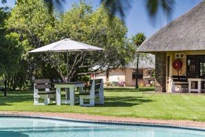 Outdoor pool, pool umbrellas, pool loungers
