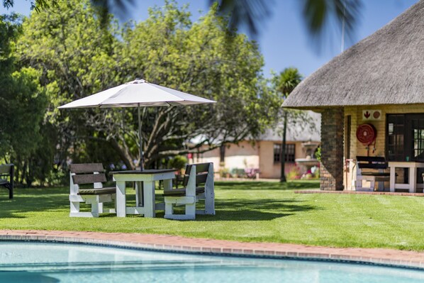 Outdoor pool, pool umbrellas, pool loungers