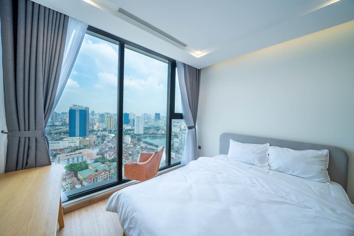 Deluxe Apartment, 2 Bedrooms | Premium bedding, desk, laptop workspace, blackout curtains