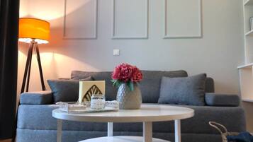 Appartement Confort | Coin séjour | Télévision à écran plat