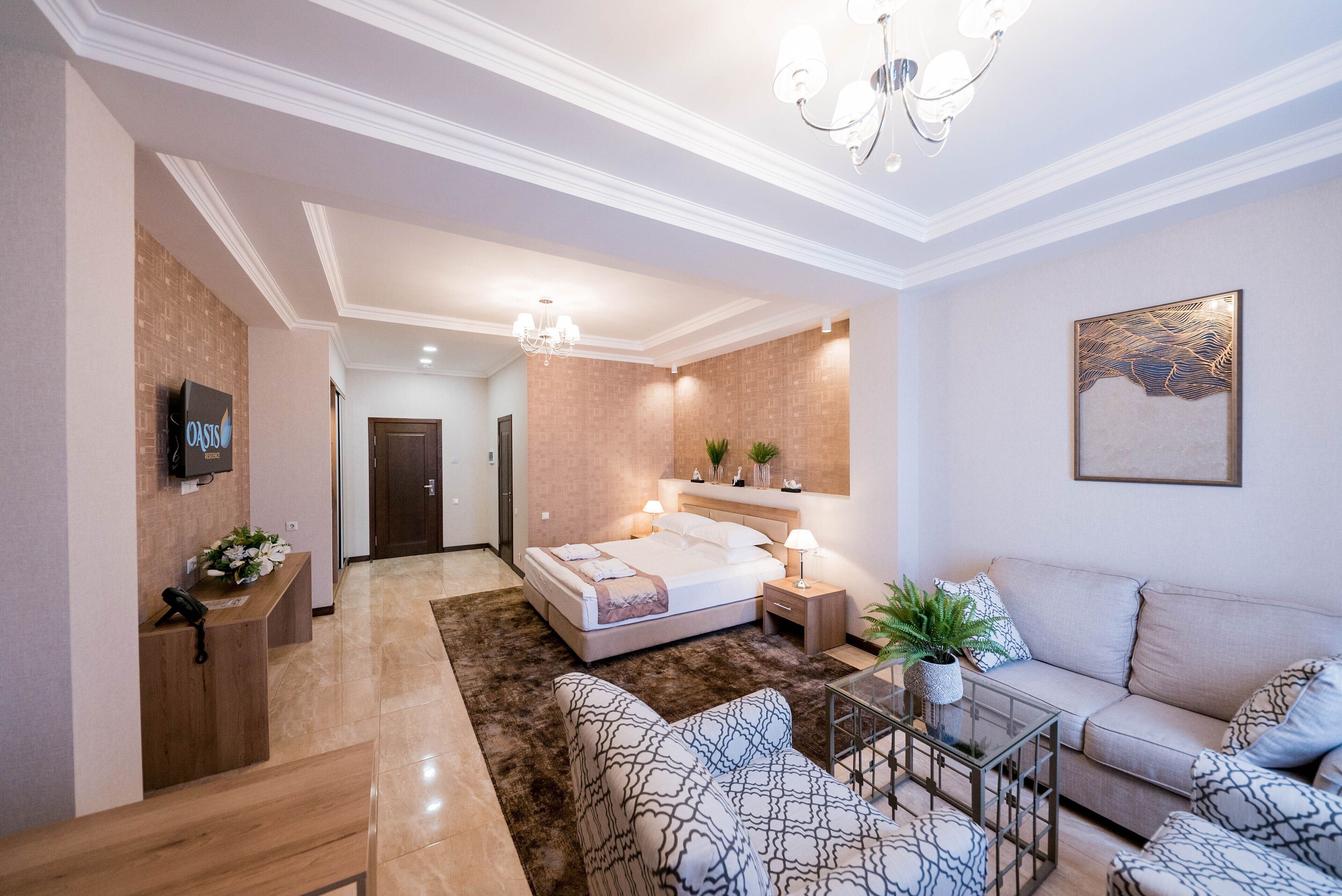 Kamar Double Deluks | Ruang keluarga | Televisi LED 47-inci dengan saluran TV kabel dan TV