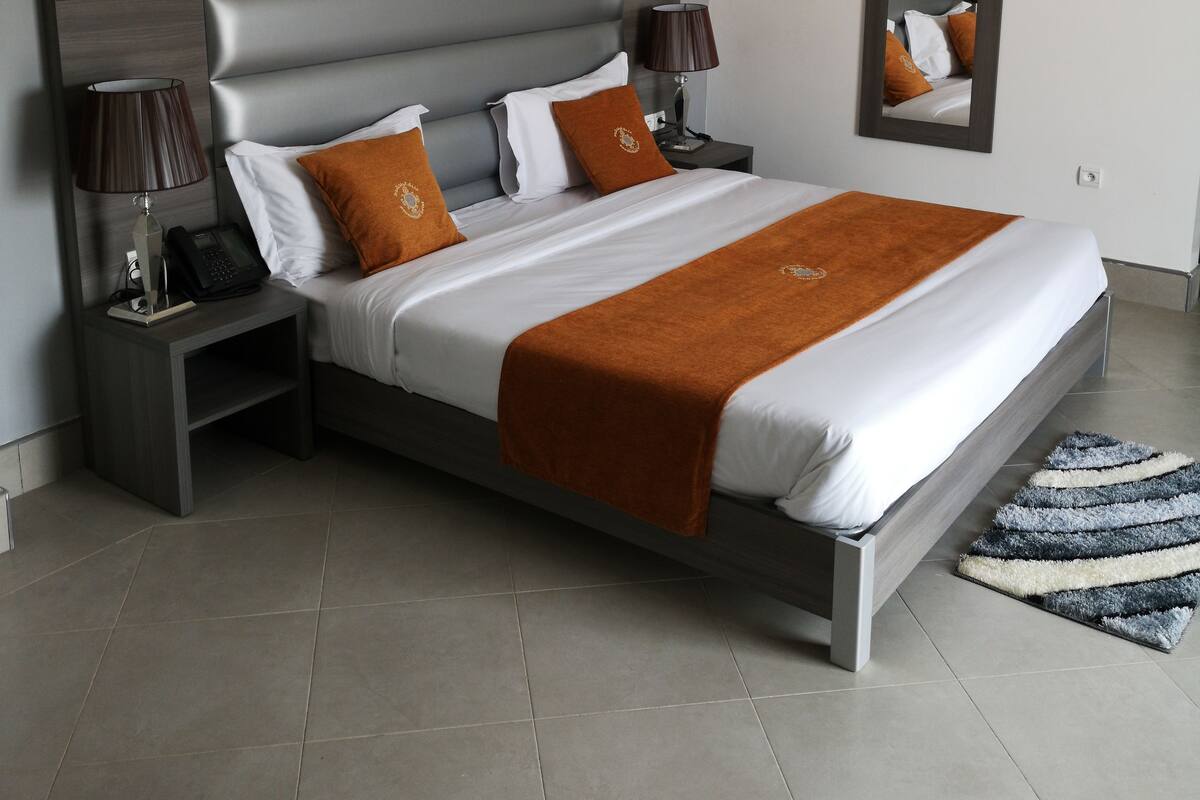 Superior Room (VIP) | Minibar, in-room safe, desk, blackout drapes