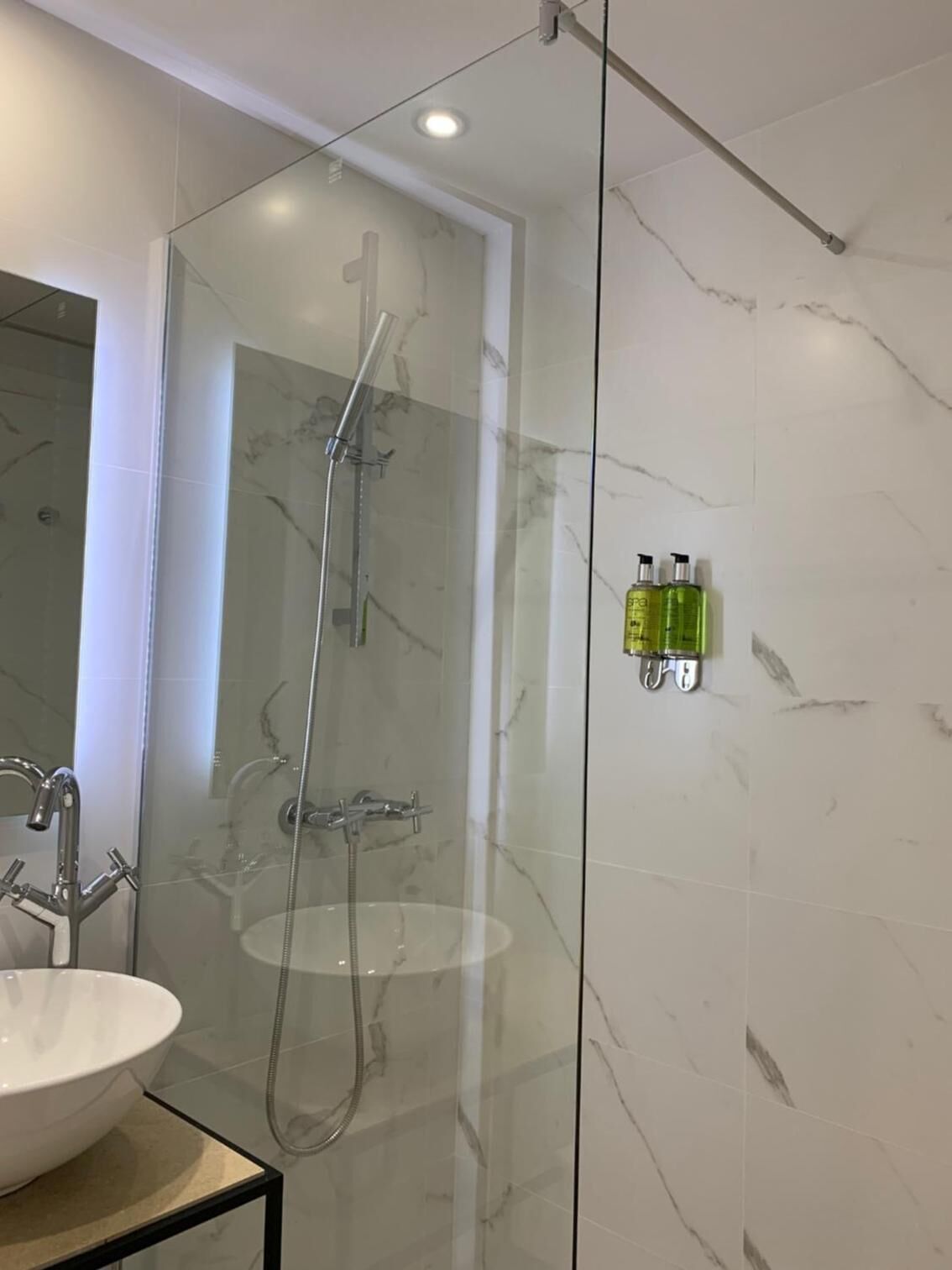 shower, free toiletries, hair dryer, towels