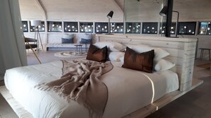 Ropa de cama de alta calidad y minibar con artículos gratuitos 