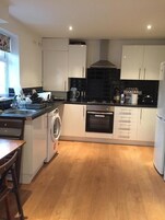 Comfort House, 4 Bedrooms | Private kitchen | Fridge, microwave, oven, stovetop