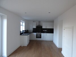 Comfort House, 4 Bedrooms | Living area | Flat-screen TV