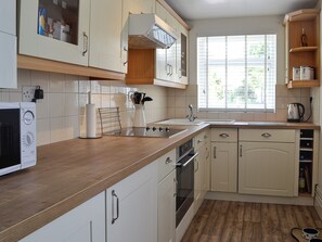 High chair, cookware/dishes/utensils - 3 bedroom accommodation in Garnant, near Ammanford (Garnant, near Ammanford)