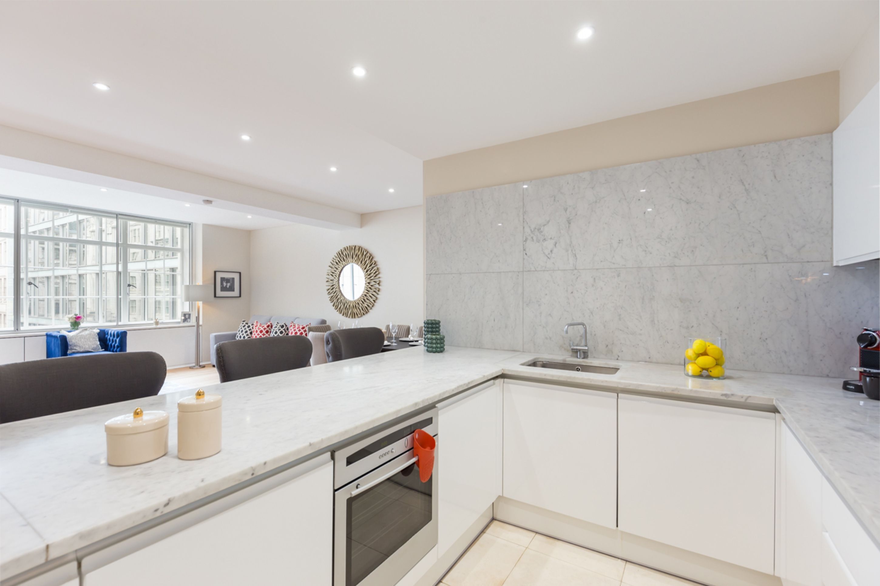 Deluxe Two Bedroom Apartment | Private kitchen | Full-sized fridge, microwave, oven, stovetop
