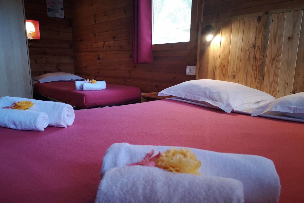 Comfort Triple Room, Garden View | Minibar, individually decorated, individually furnished