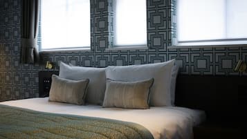 Habitación ejecutiva | Escritorio, espacio para trabajar con laptop y cortinas blackout