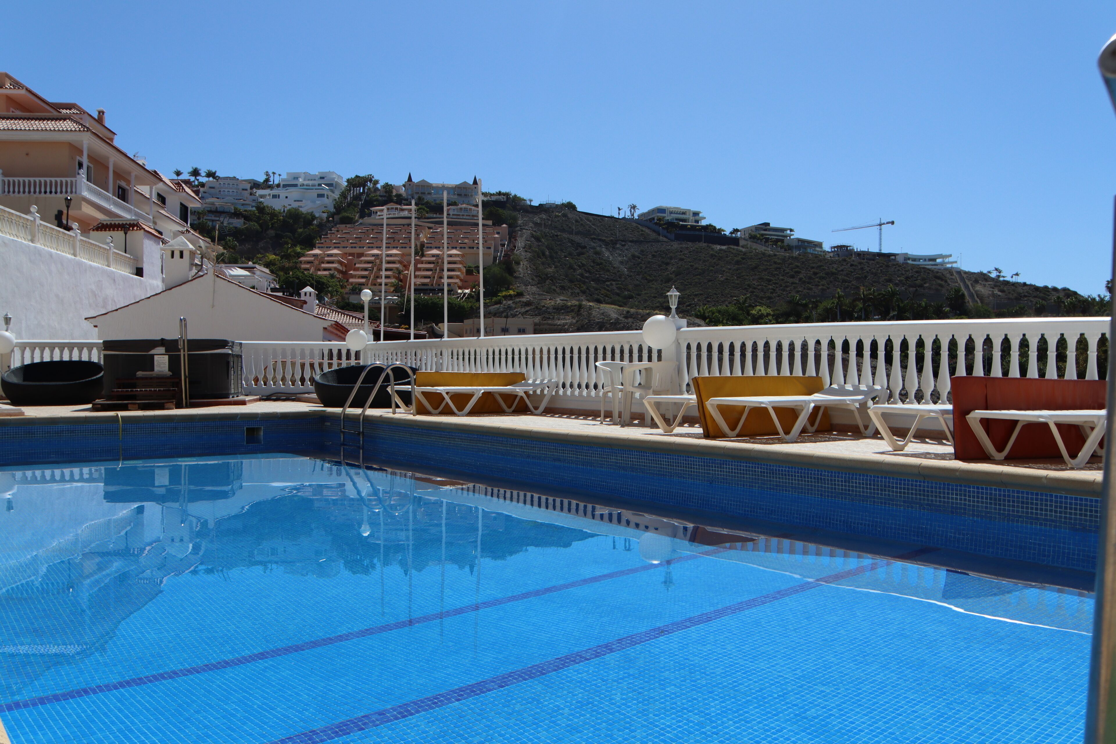 Outdoor pool, open 9:00 AM to 8:00 PM, sun loungers