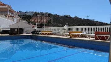 Outdoor pool, open 9:00 AM to 8:00 PM, sun loungers