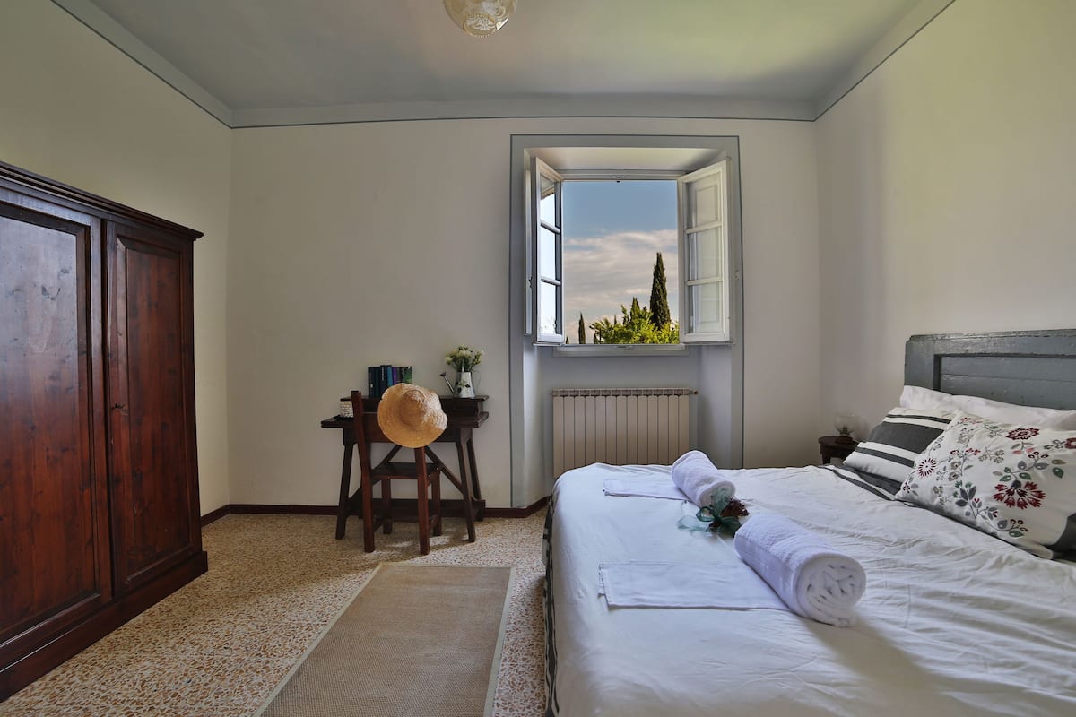 Apartment, 1 Bedroom (Cipresso) | 1 bedroom, in-room safe, bed sheets