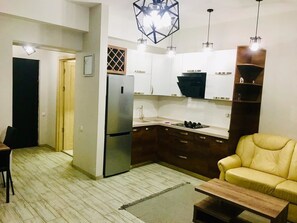 Standard Apartment (1 Berbuki Street 6, Saburtalo) | Private kitchen | Full-sized fridge, microwave, dishwasher, cookware/dishes/utensils - Apartment on Berbuki str. (Tbilisi)