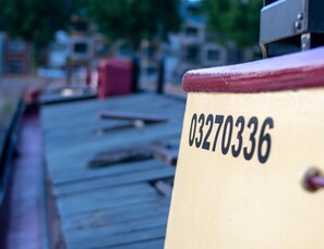 A close-up of a boat's side with the number 03270336 visible. - Boat apartment Rotterdam Hoop (Rotterdam)