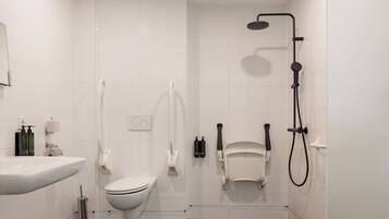 Standard Quadruple Room, Accessible | Bathroom | Shower, hair dryer, towels, soap
