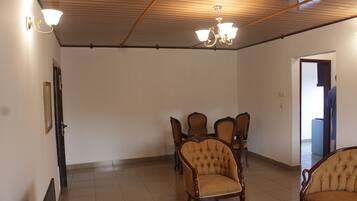 Classic Apartment, 1 Bedroom | Living area | Flat-screen TV